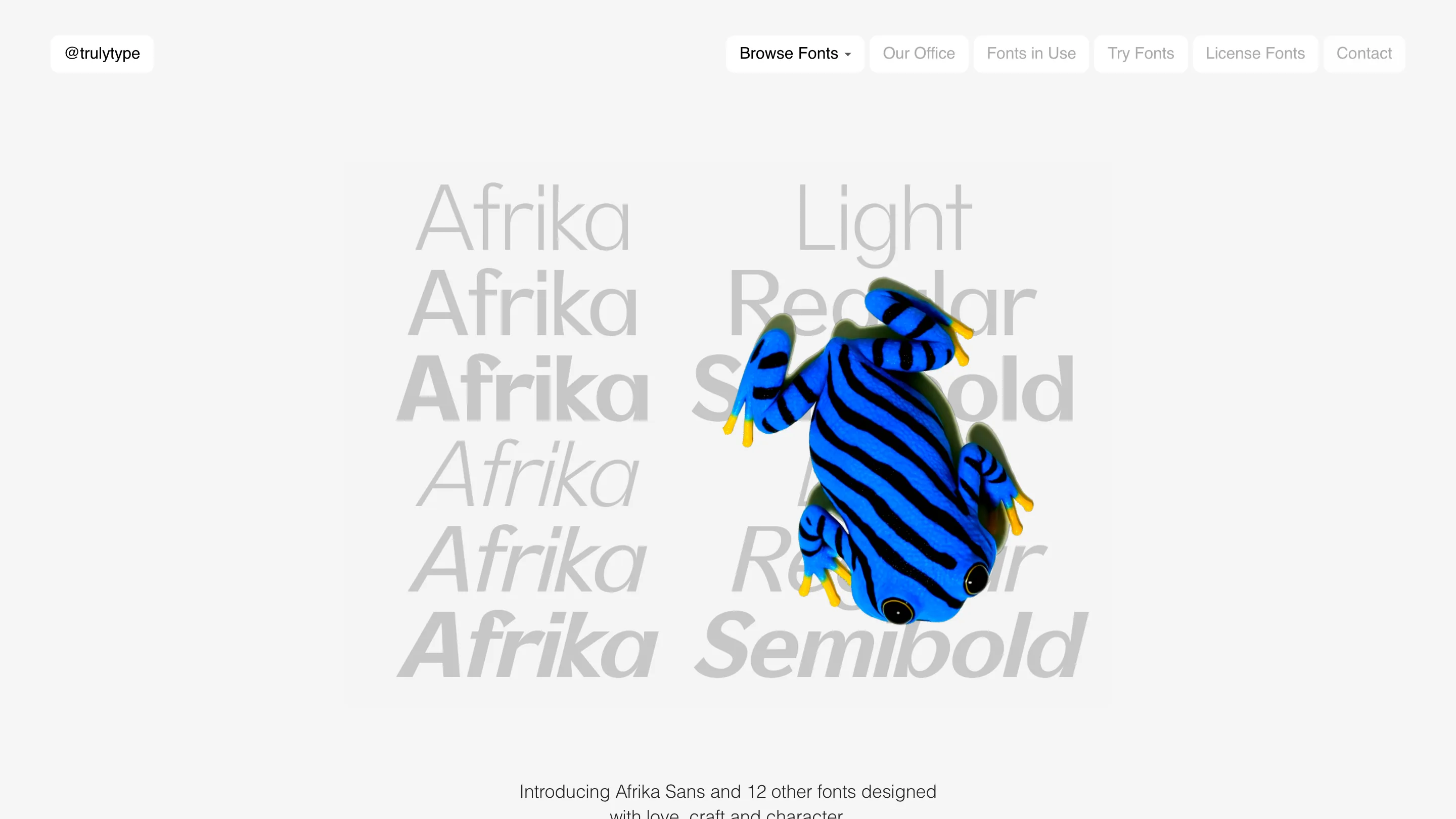 Trulytype homepage: the word Afrika layered in Light, Regular and Semibold weights in gray, with a blue-and-black striped frog resting on top of the type.